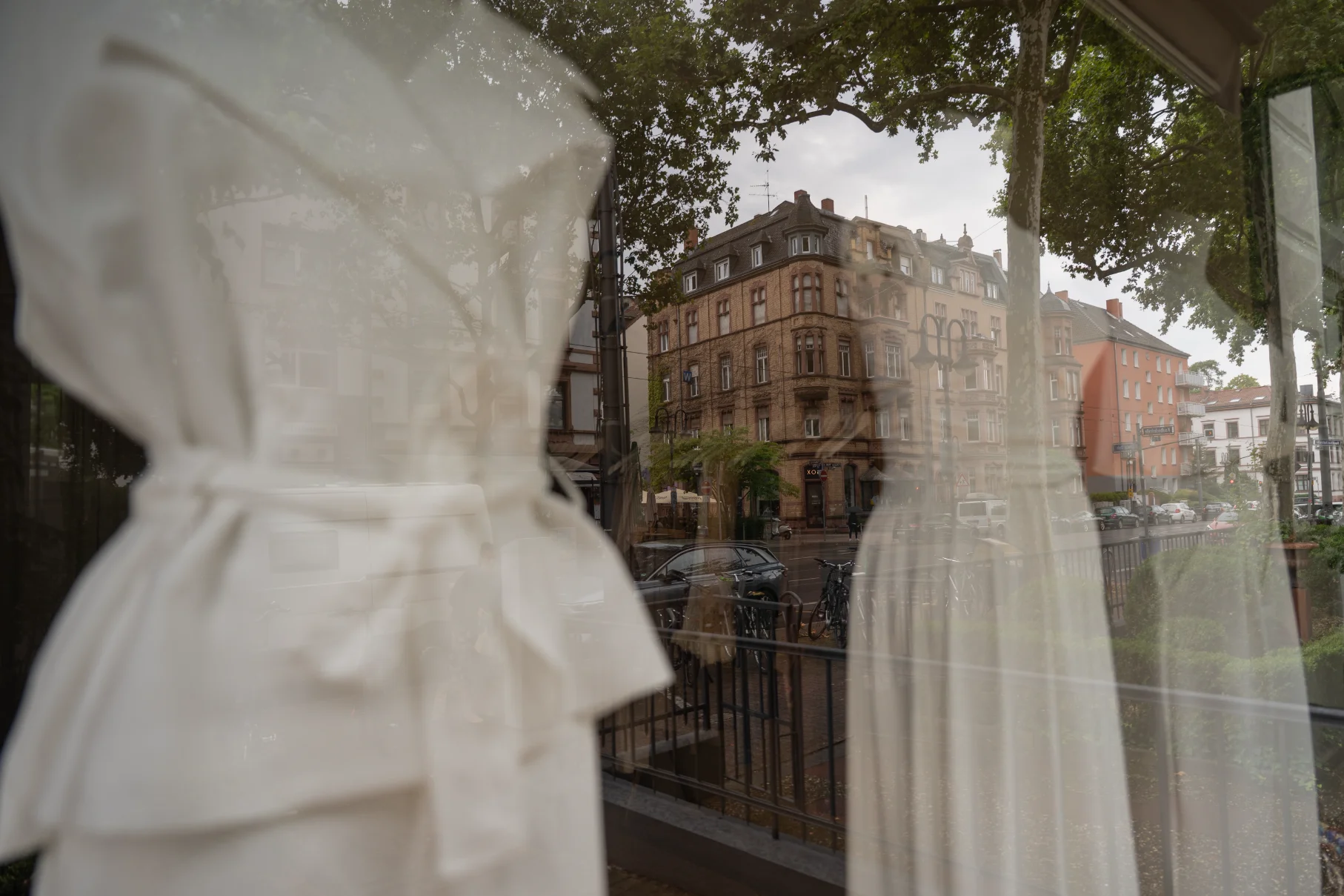 Walking through a historic German town during a the Wedding dress fitting, by Poga Studios