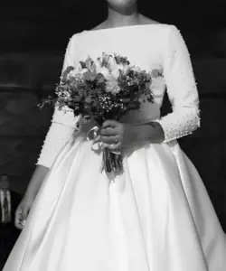 Bride with her flowers bouquet, big entrance to her reception at Mexico Destination Wedding, by Poga Studios